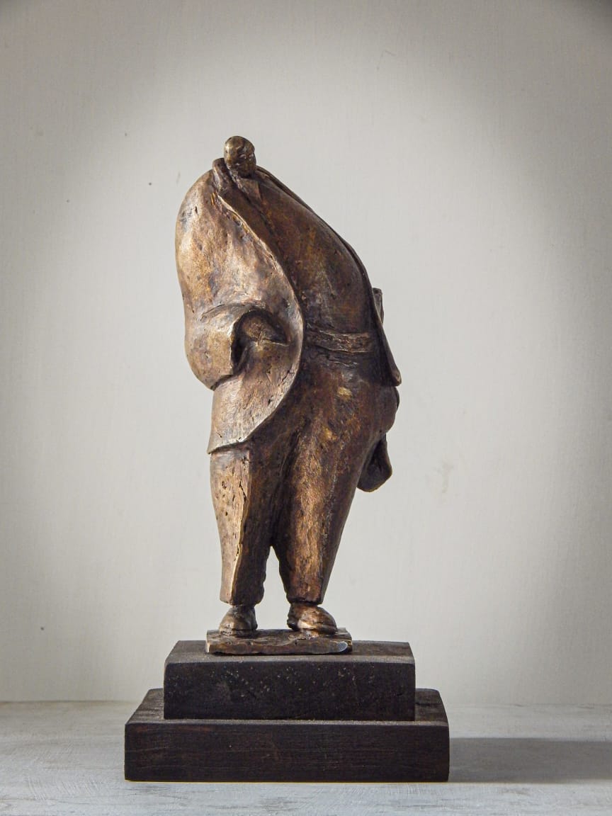 Figurative Sculpture with Bronze"Not Out" art by Prabir Roy
