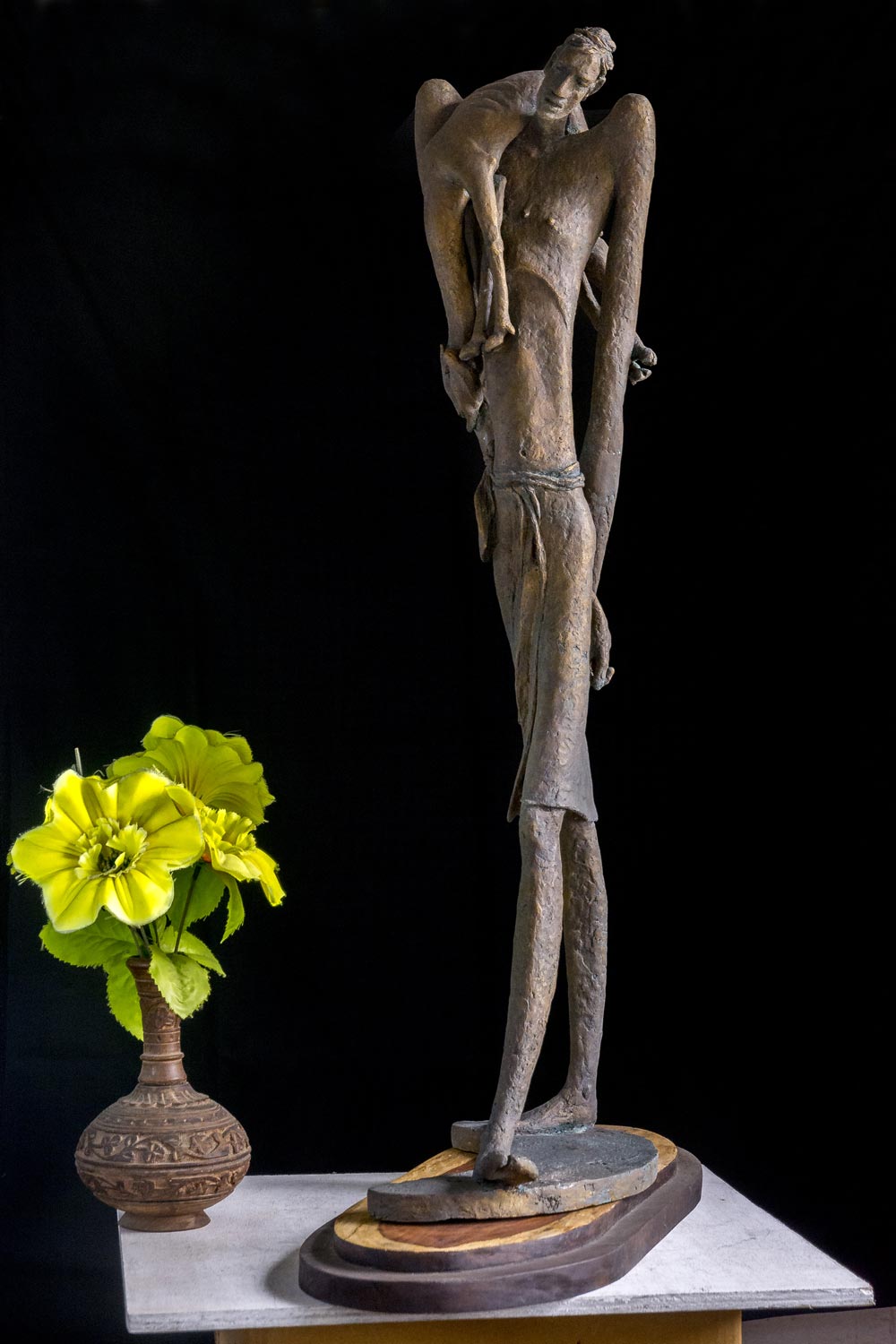 Figurative Sculpture with Bronze"Last Journey" art by Prabir Roy