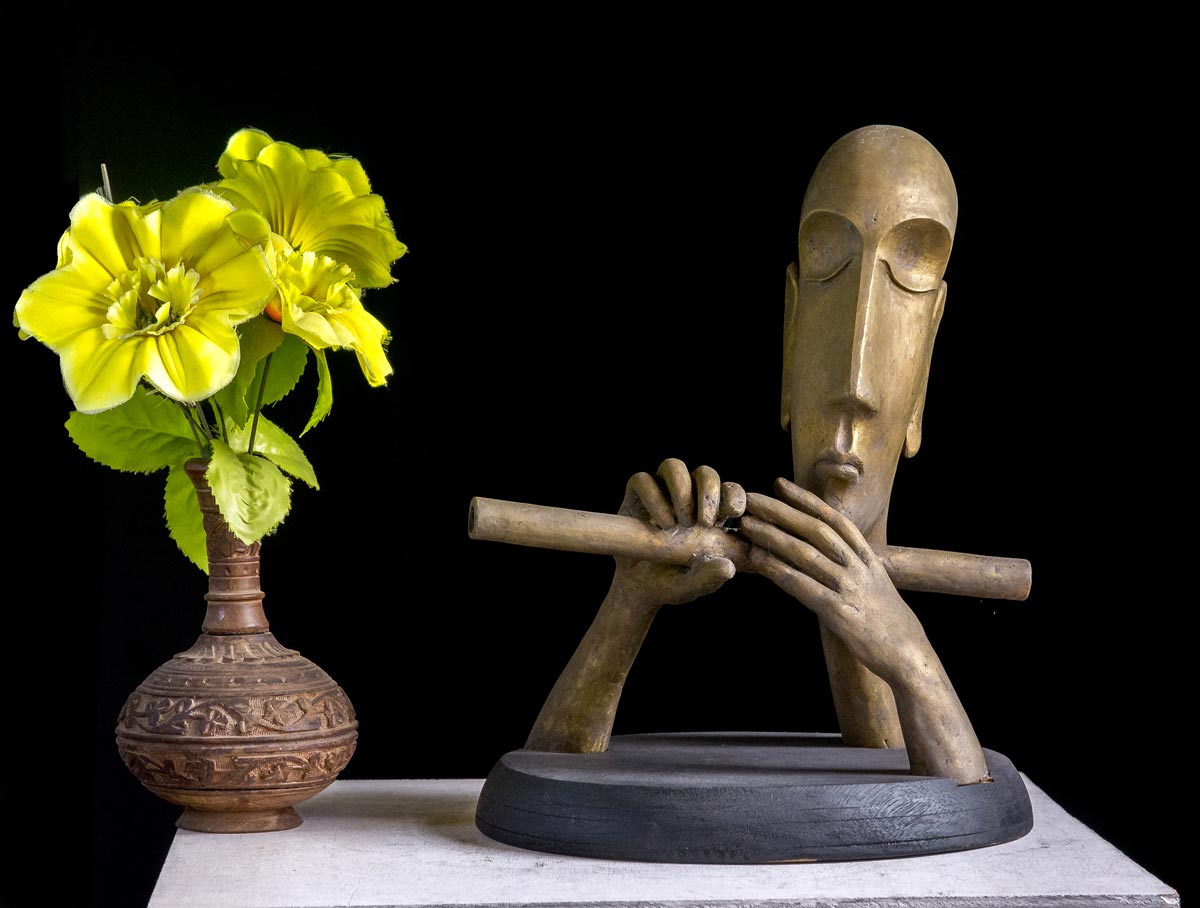 Figurative Sculpture with Bronze"Tune" art by Prabir Roy